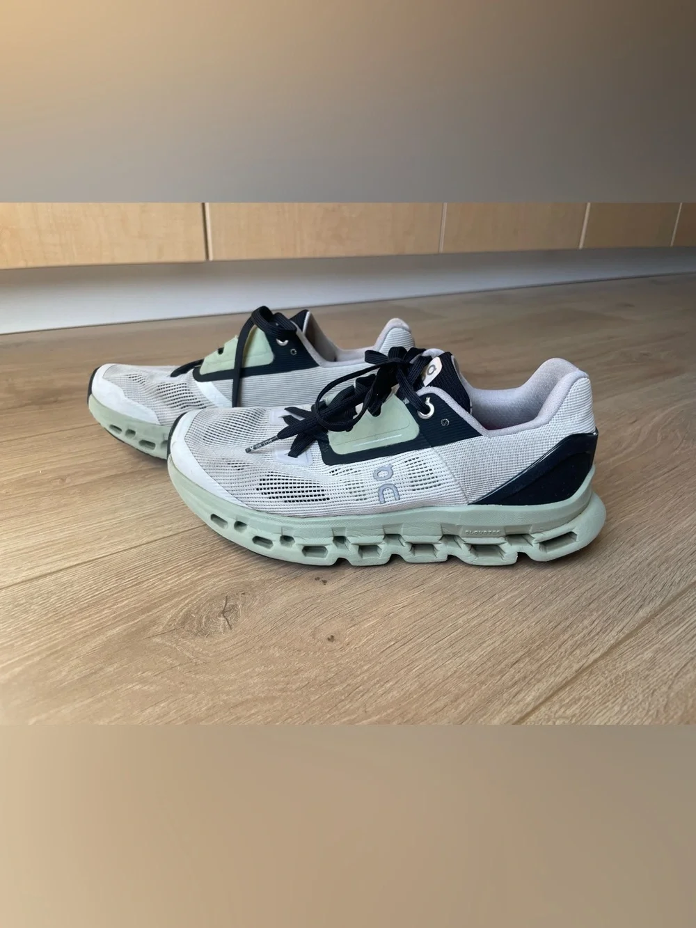 On Running Sneakers in White, Mint, and Black